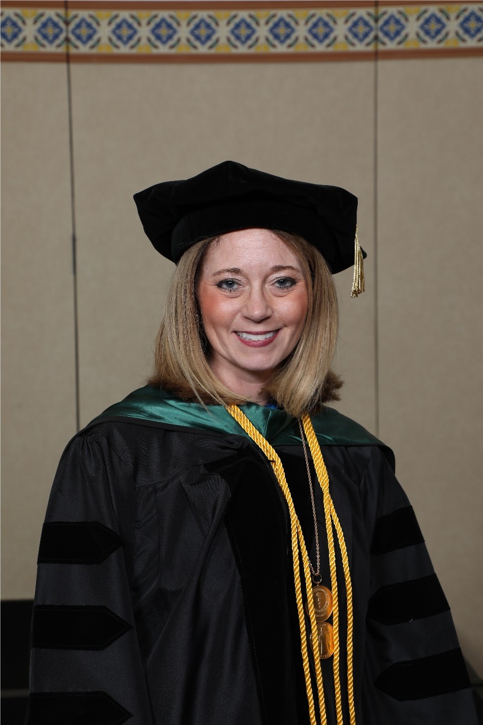 Bixler Fellow Shot An image of Nicole Bixler in her Fellowship robe
