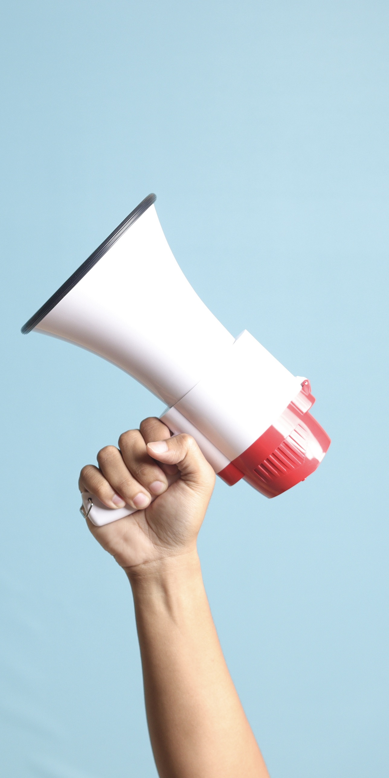 hand holding megaphone