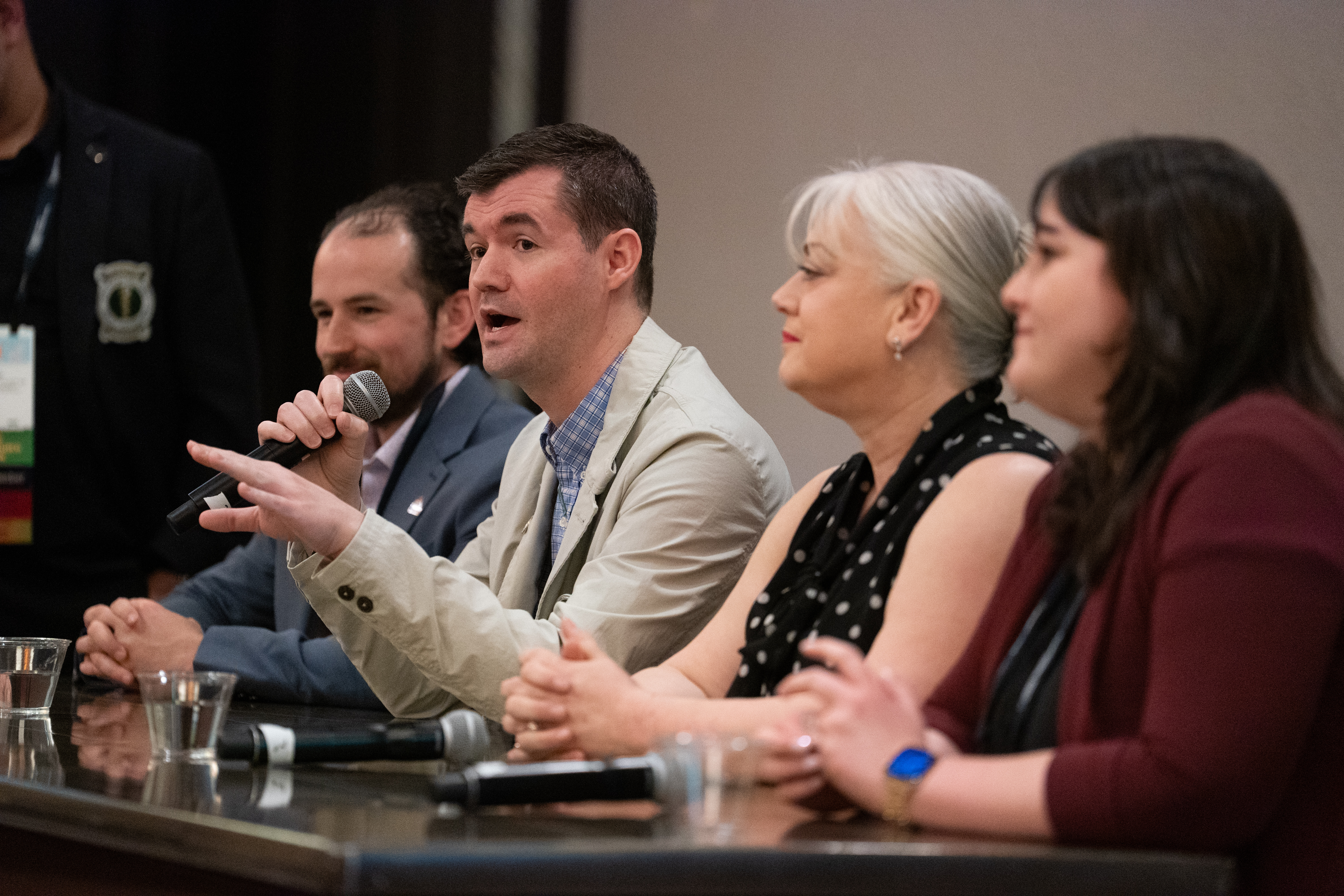 Speaker speaking in a panel